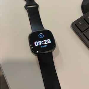 Fitbit sense with charger